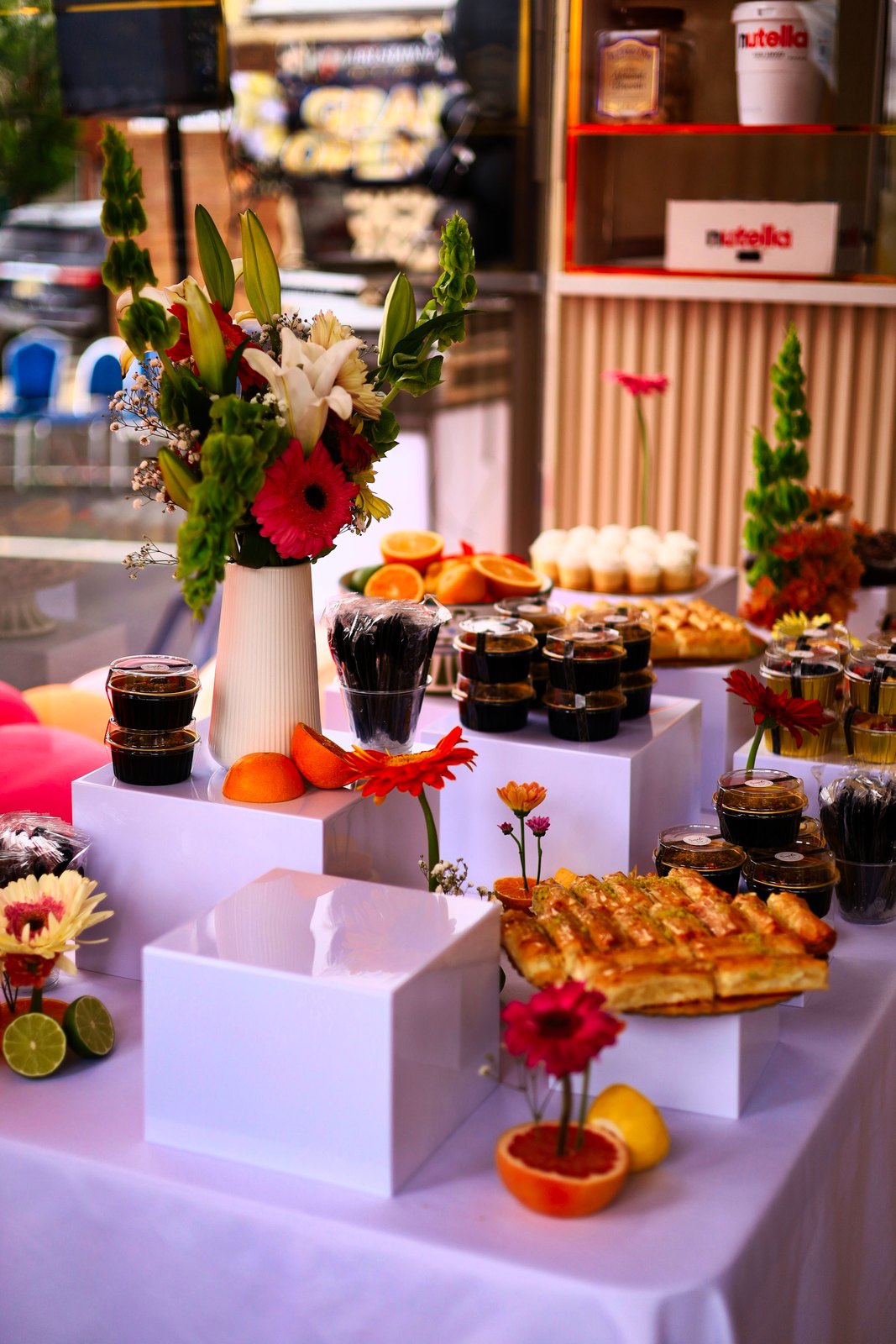 Desserts and drinks arranged on a table