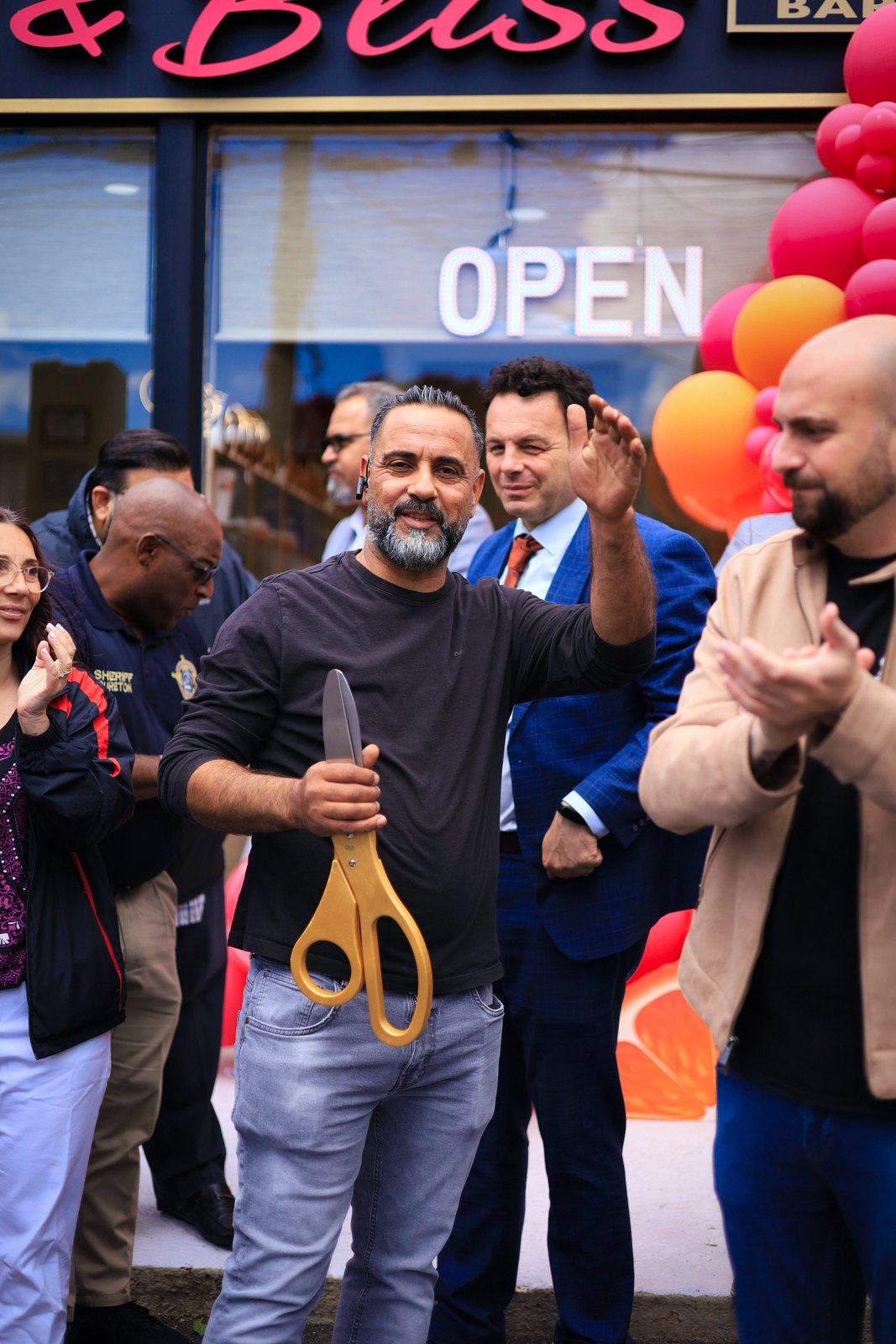 Grand opening moment outside the store